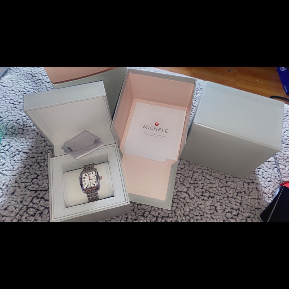 Silver Michele watch.